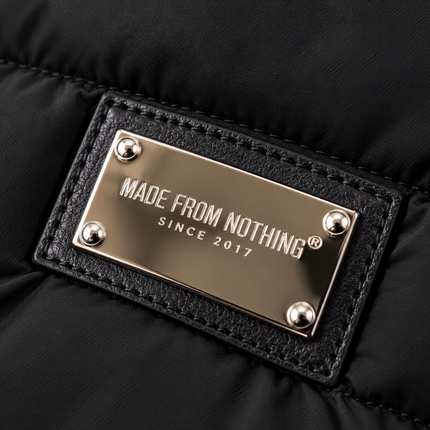 Giubbotto Made from NOTHIG uomo con cappuccio e maniche effetto pelle – Nero