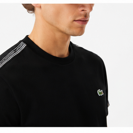 T-shirt nera con banda laterale