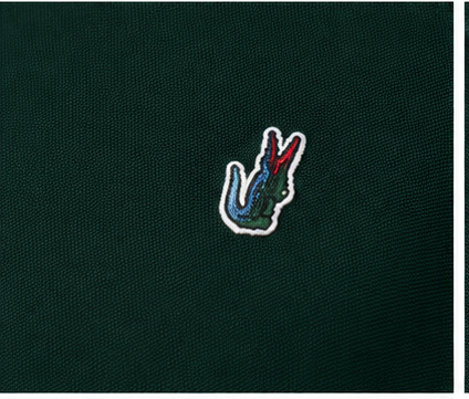 Polo Lacoste nera/verde logo multicolor