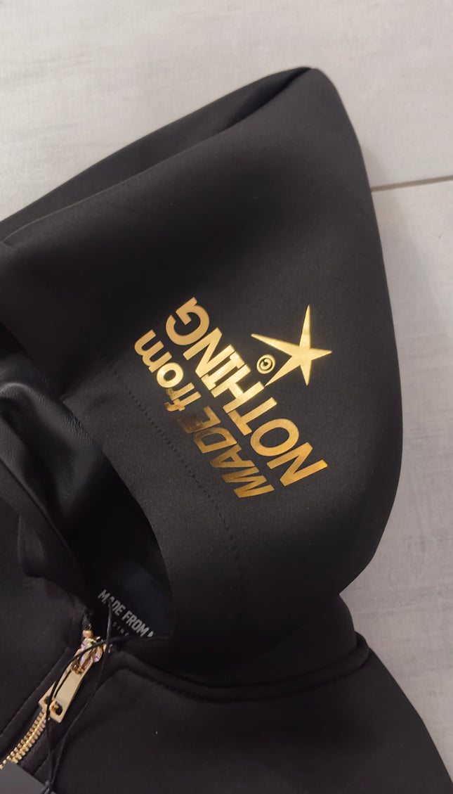 Giacca M. F. N in naylon e maniche in eco pelle